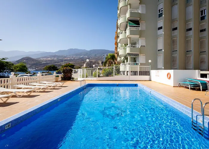 Beachfront With Communal Swimming Pool And Parking